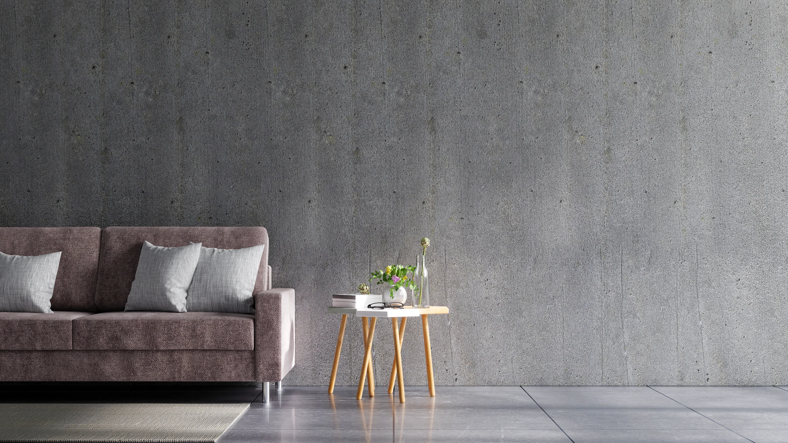Minimalistischer Wohnraum mit Sichtbetonwand
